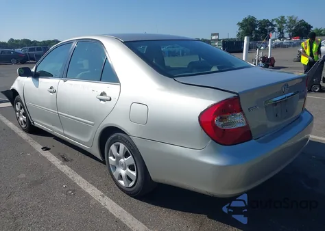2002 Toyota Camry Le from USA, damaged, VIN 4T1BE32K22U530911